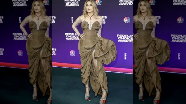 Paris Jackson wearing a brown dress