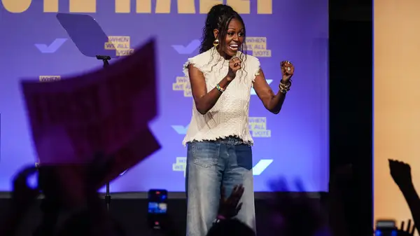 Michelle Obama speaking at a voting event