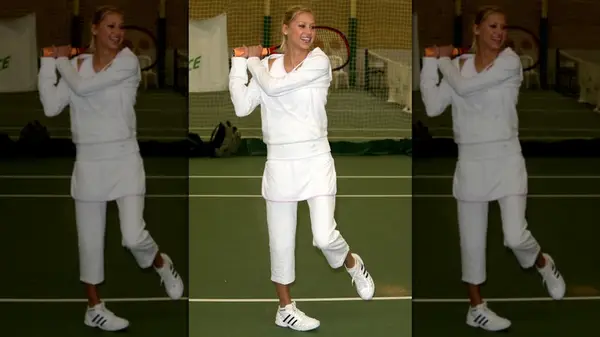 Anna Kournikova in a white tennis outfit
