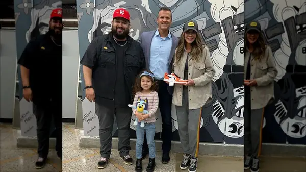 Kristi Noem posing with friends wearing casual clothing