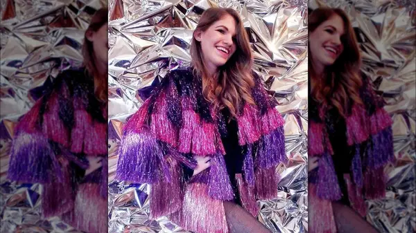 Woman in fringe jacket