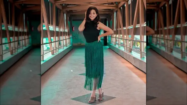 Woman in a fringe skirt