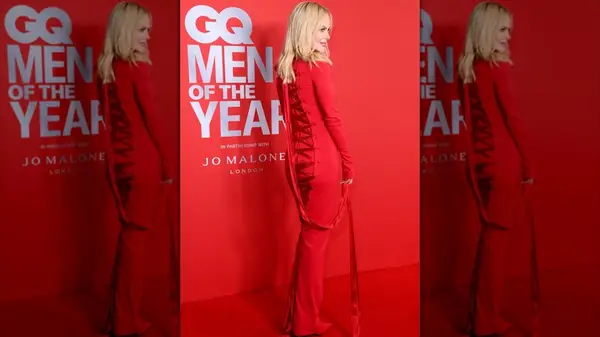 Nicole Kidman on the red carpet in a red dress