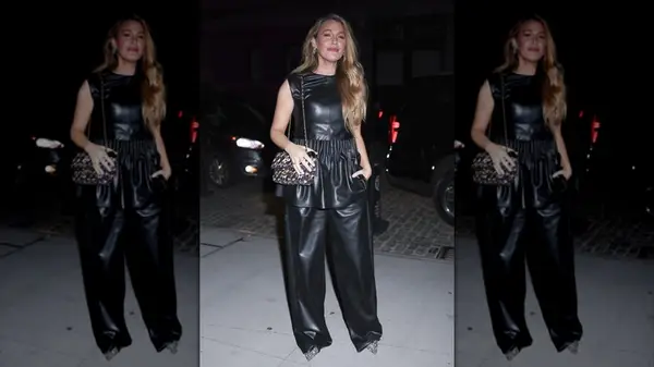 Blake Lively on the street in a black leather matching set