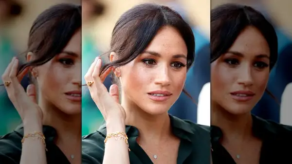 Meghan Markle with a signet ring on her ring finger