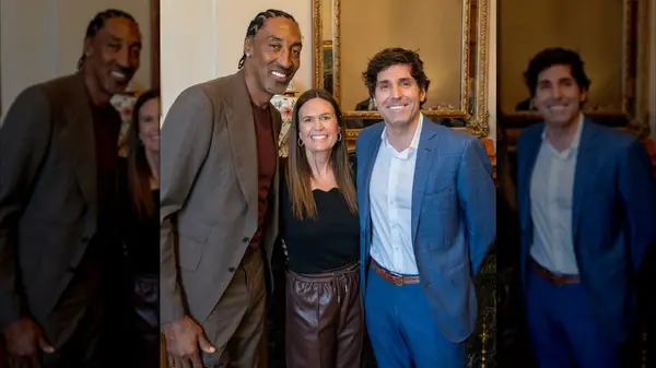 Sarah Huckabee Sanders with husband and Scottie Pippen at an event