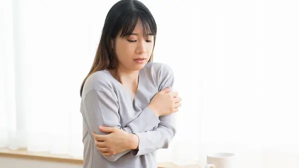 cold woman wearing tshirt