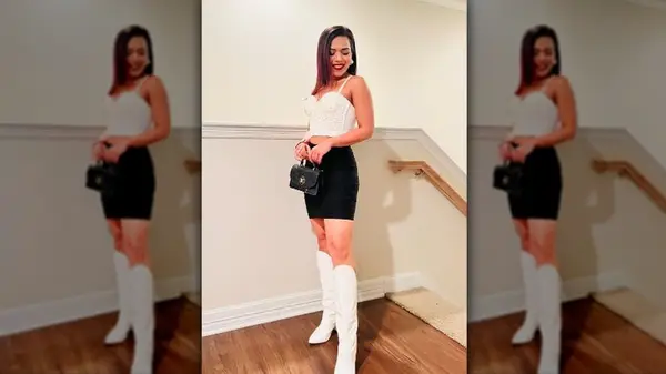 Woman in black and white outfit