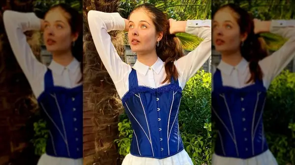 Woman in blue corset