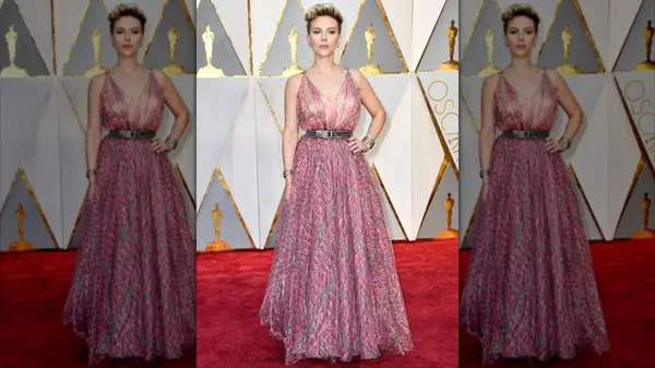 Scarlett Johansson at an event in a long pink dress