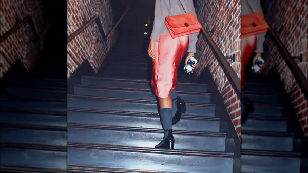 Woman walking upstairs