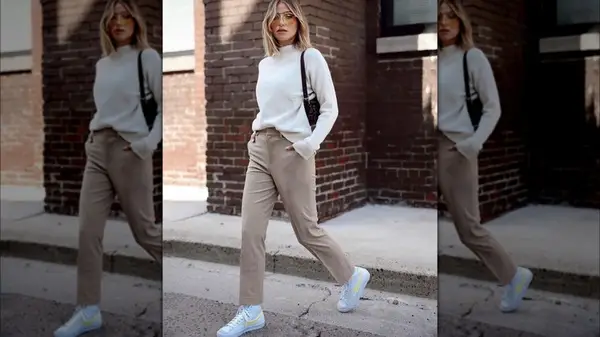 woman in white sweater, khaki pants