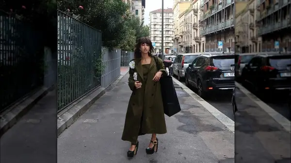 woman in oversized green jacket