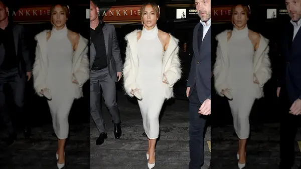 Jennifer Lopez in a white dress, white coat and white heels