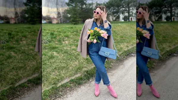 Woman holding denim bag