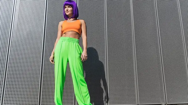 Woman wearing bold athletic pants