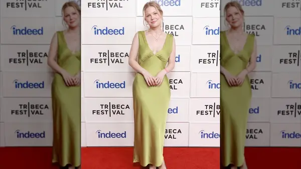 Krista Hedins wears light green dress