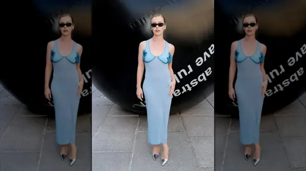 Lauren Lyle wears baby blue to RA summer exhibition