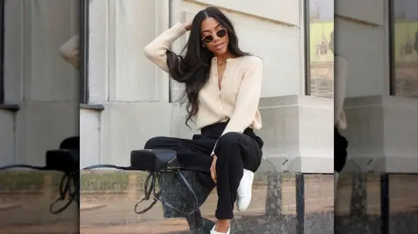 Woman in cardigan and cropped pants