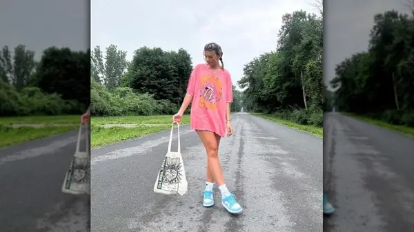 Woman in oversized shirt