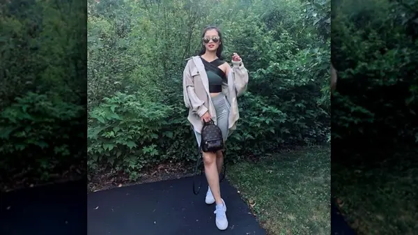 Woman in shorts and coat