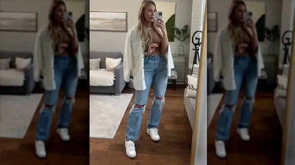 Woman in open jacket and jeans