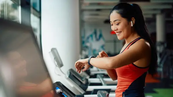 Woman looking at watch