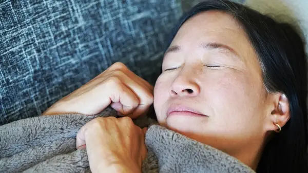 Middle aged woman sleeping