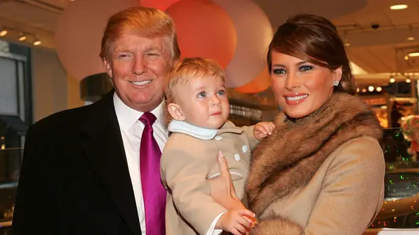 Donald, Melania, and Barron Trump when Barron was a baby at an event