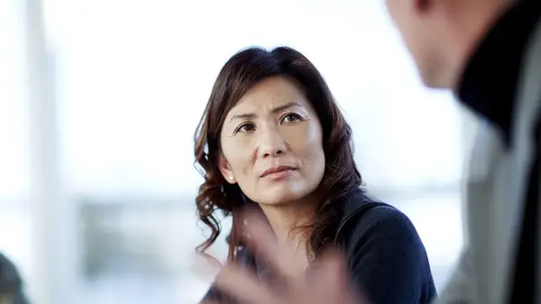 woman listening to man