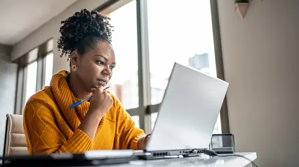 Woman working on her laptop 
