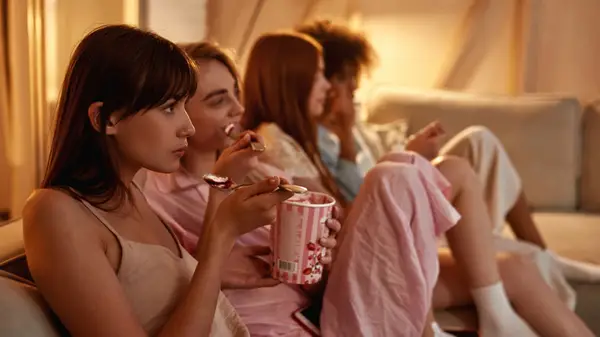 Group of women having a movie night