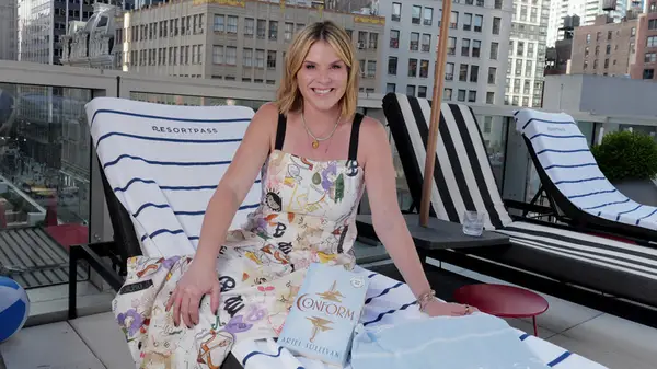Jenna Bush Hager sitting on a lounge chair