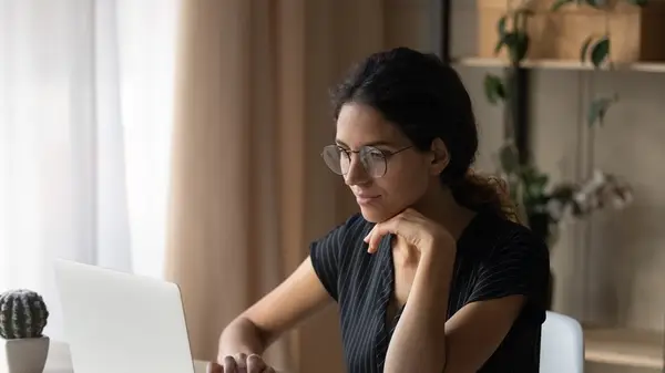 woman staring at email