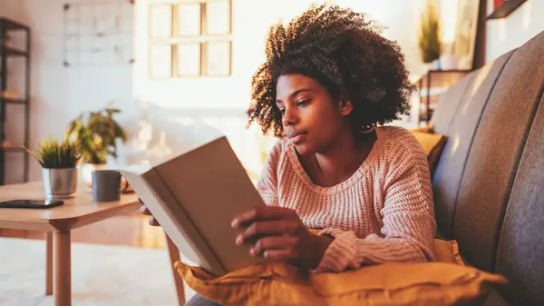 Woman reading on the couch