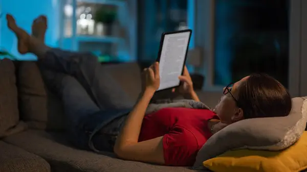 woman reading on kindle