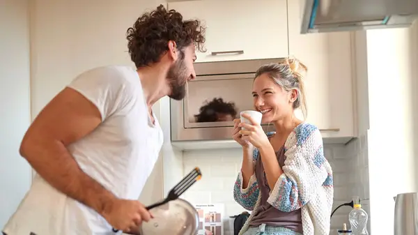 A couple in the kitchen 