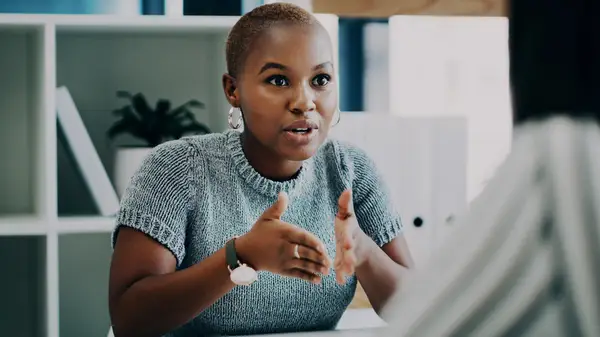 People talking in office