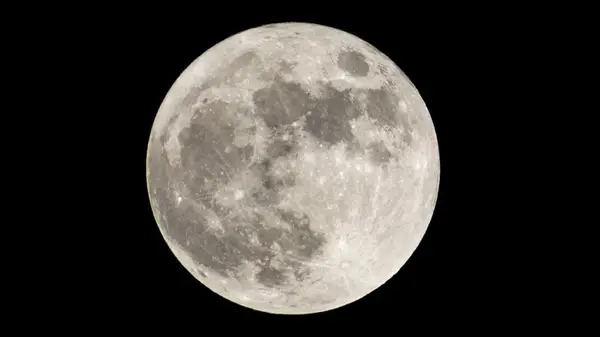 Full moon in black sky