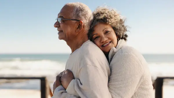 Mature couple snuggling