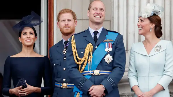 Meghan Markle, Princes Harry and William, and Kate Middleton on the Buckingham Palace balcony