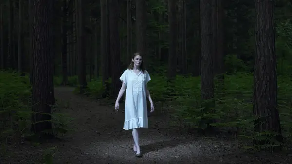 woman alone in forest