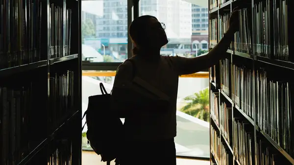 Woman in a library