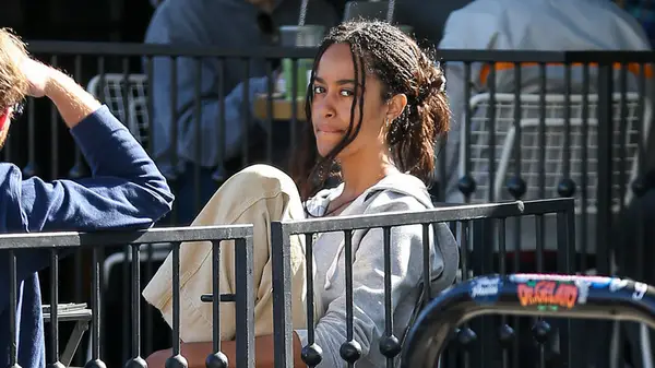 Malia Obama with a neutral expression