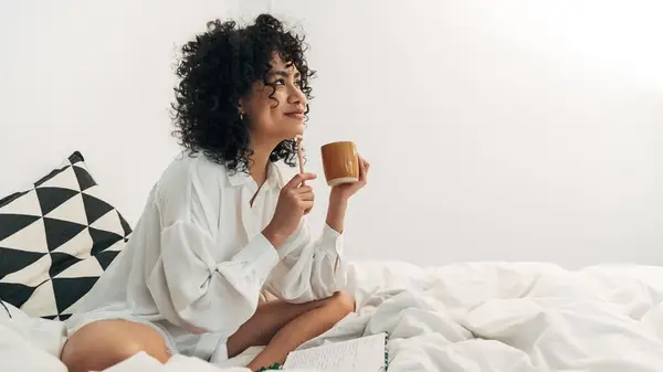young woman journaling