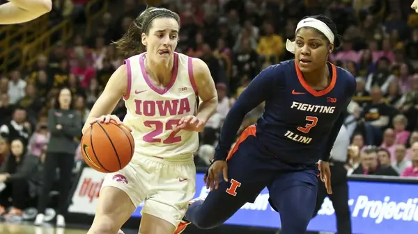 Caitlin Clark playing for the Iowa Hawkeyes
