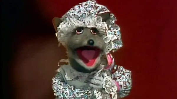 mouse muppet wears pajamas