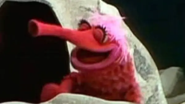 red muppet with long nose
