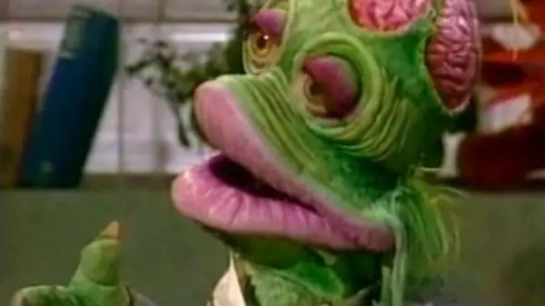 green amphibian muppet