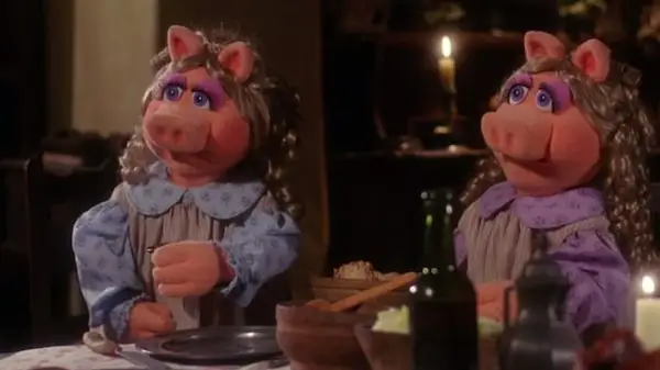 muppet in blue nightgown